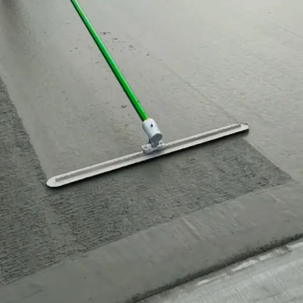 Fresno trowel without broom in use on a concrete slab